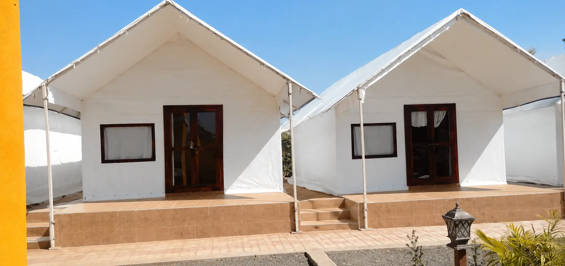 Waterproof resort tent with cottage style accommodation